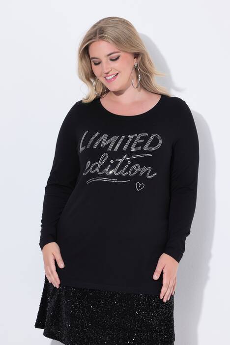 Maglia dal taglio svasato con scritta glitterata e maniche lunghe