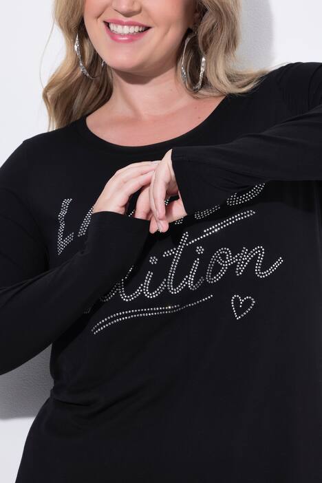 Maglia dal taglio svasato con scritta glitterata e maniche lunghe
