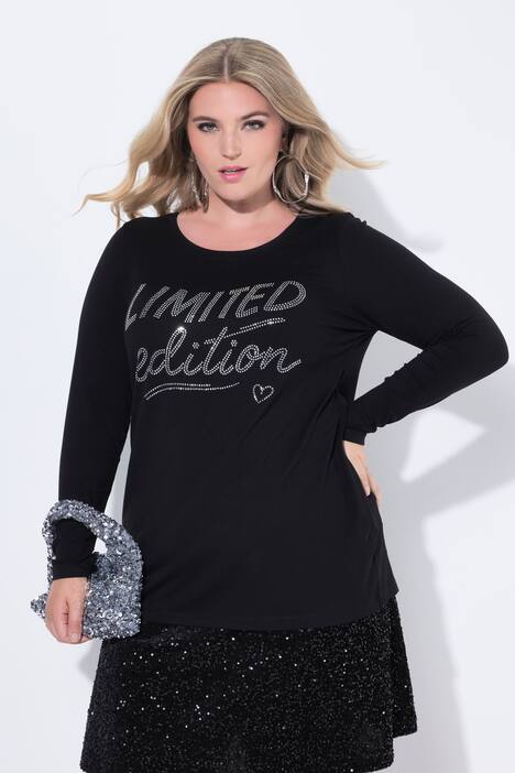Maglia dal taglio svasato con scritta glitterata e maniche lunghe