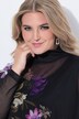 Blusa dal taglio oversize in mesh con design floreale e top coprente