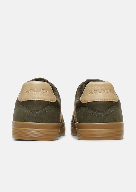 Sneaker in Leder-Optik mit Artwork-Details