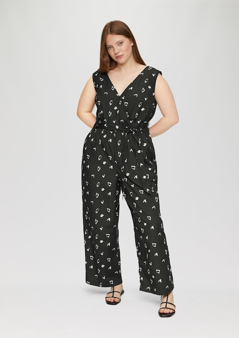 Ärmelloser Jumpsuit mit Eingrifftaschen und Bindeband