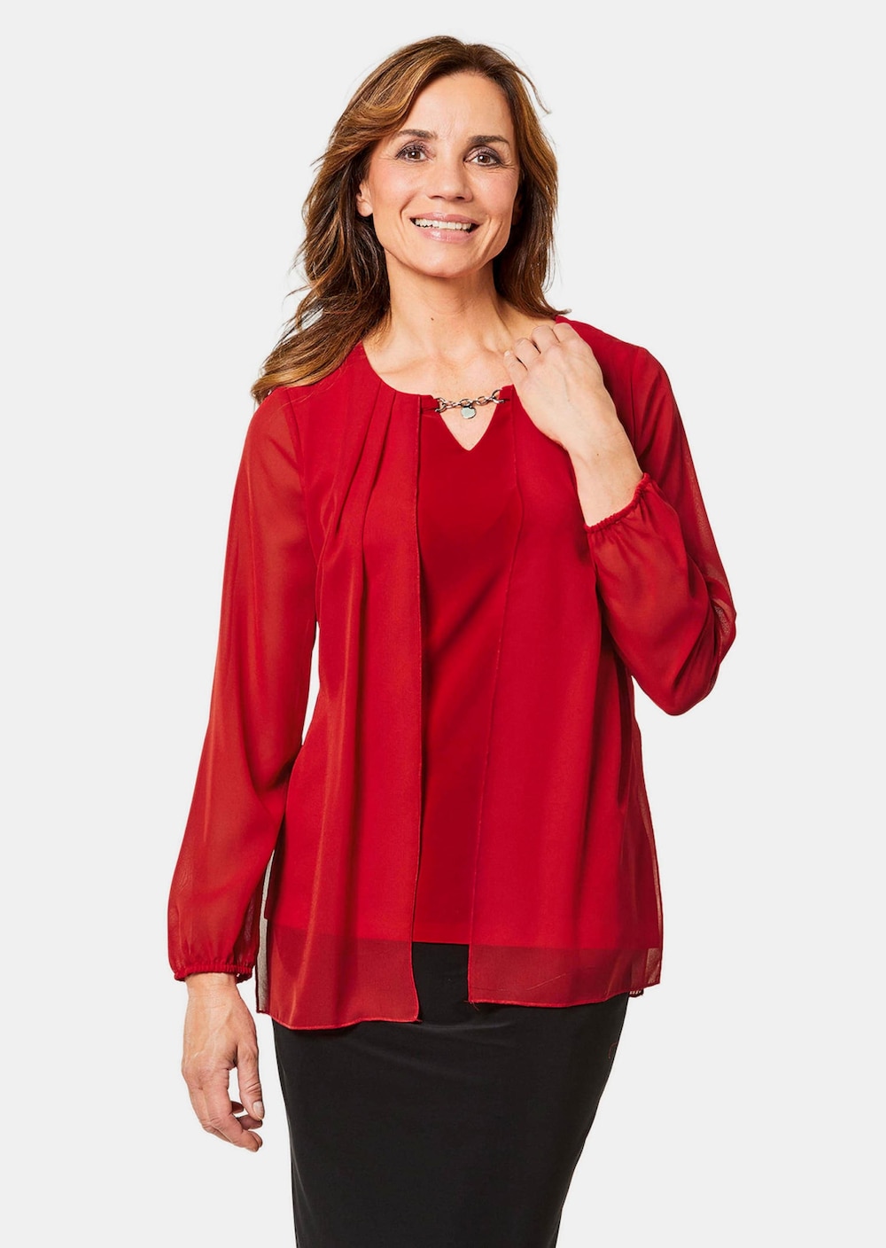 Festliche Bluse mit Chiffonüberwurf und Schmuckelement