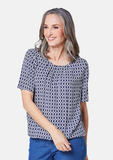 Farbbrillante Druckbluse mit liebevollen Details