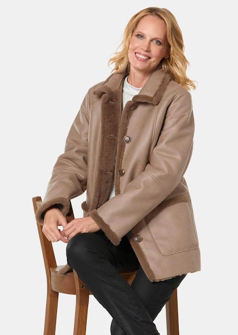 Kuschelige Longjacke in Lederoptik