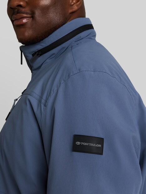 Blouson Jacke mit verstaubarer Kapuze