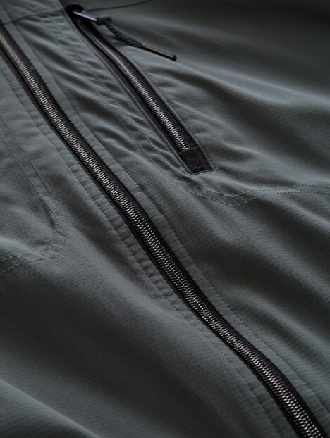 Blouson Jacke mit verstaubarer Kapuze