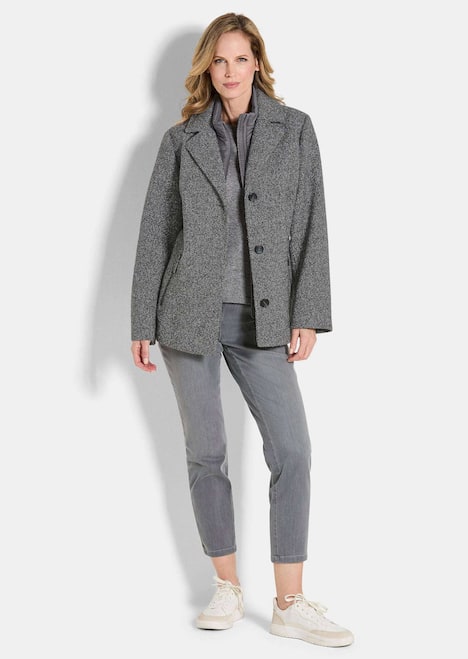 Moderne Wolljacke mit Steppeinsatz