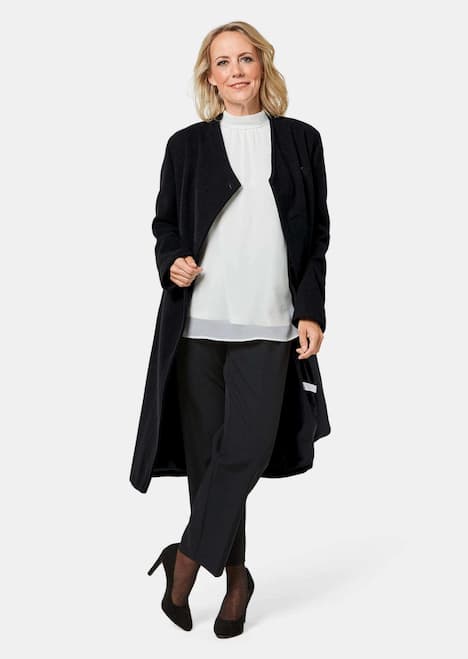 Wärmender Wollmantel