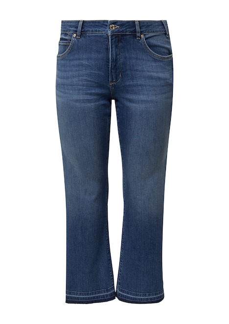 Jeans / Mid Rise / Flared Fit / offener Saum