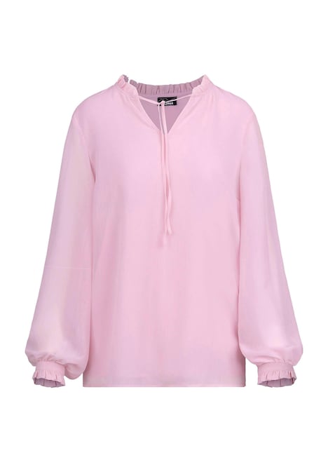 Vrouwelijke blouse met ruches