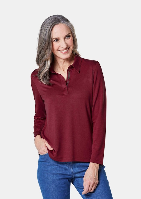 Langarm Poloshirt mit Schmuckband an Knopfleiste
