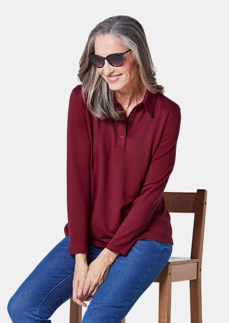 Langarm Poloshirt mit Schmuckband an Knopfleiste