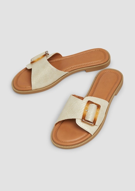 Slides mit Schmuck-Detail