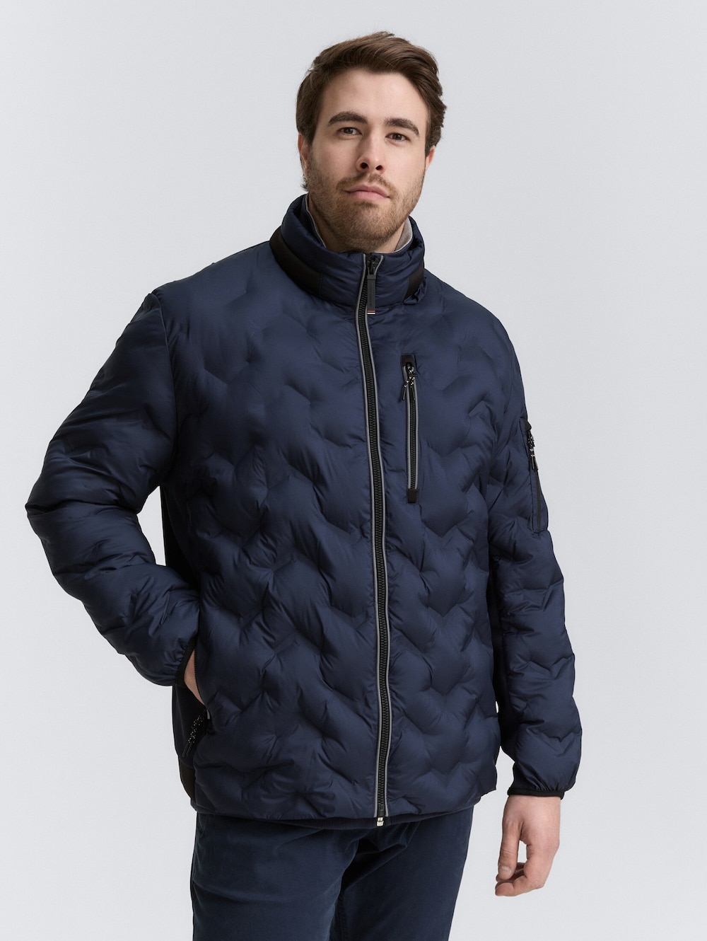 Hybrid Lightweight Steppjacke mit verstaubarer Kapuze