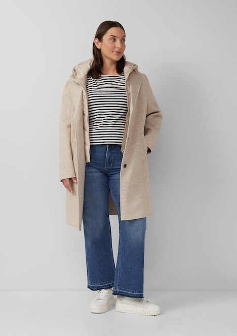 Jeans / Mid Rise / Flared Fit / offener Saum