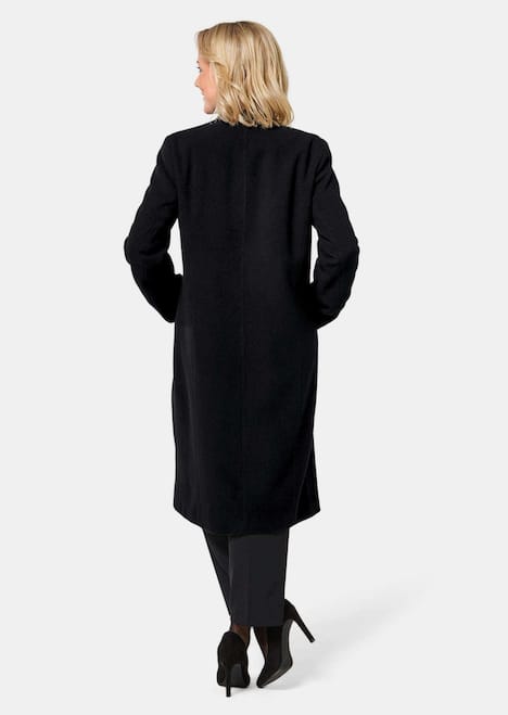 Wärmender Wollmantel