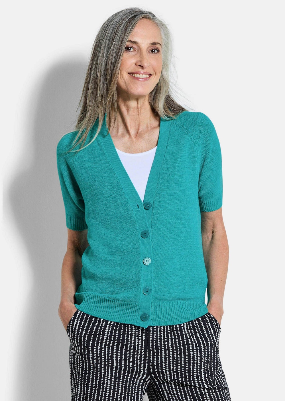 Damesvest in roze, halflange mouwen