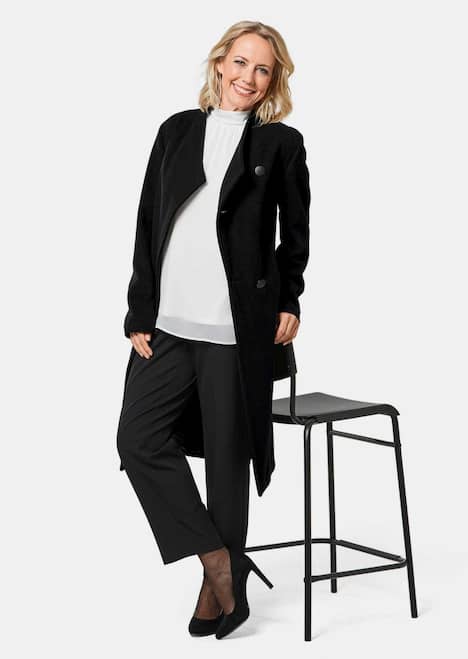 Wärmender Wollmantel