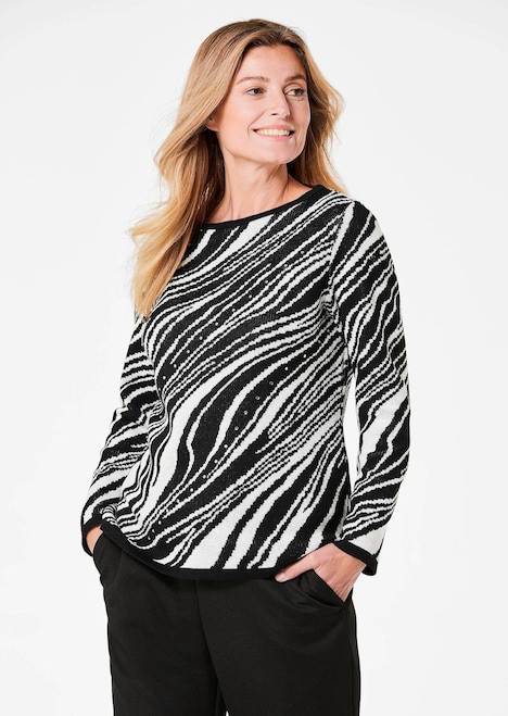 Ausdrucksstarker Pullover mit handverarbeiteten Glitzersteinen