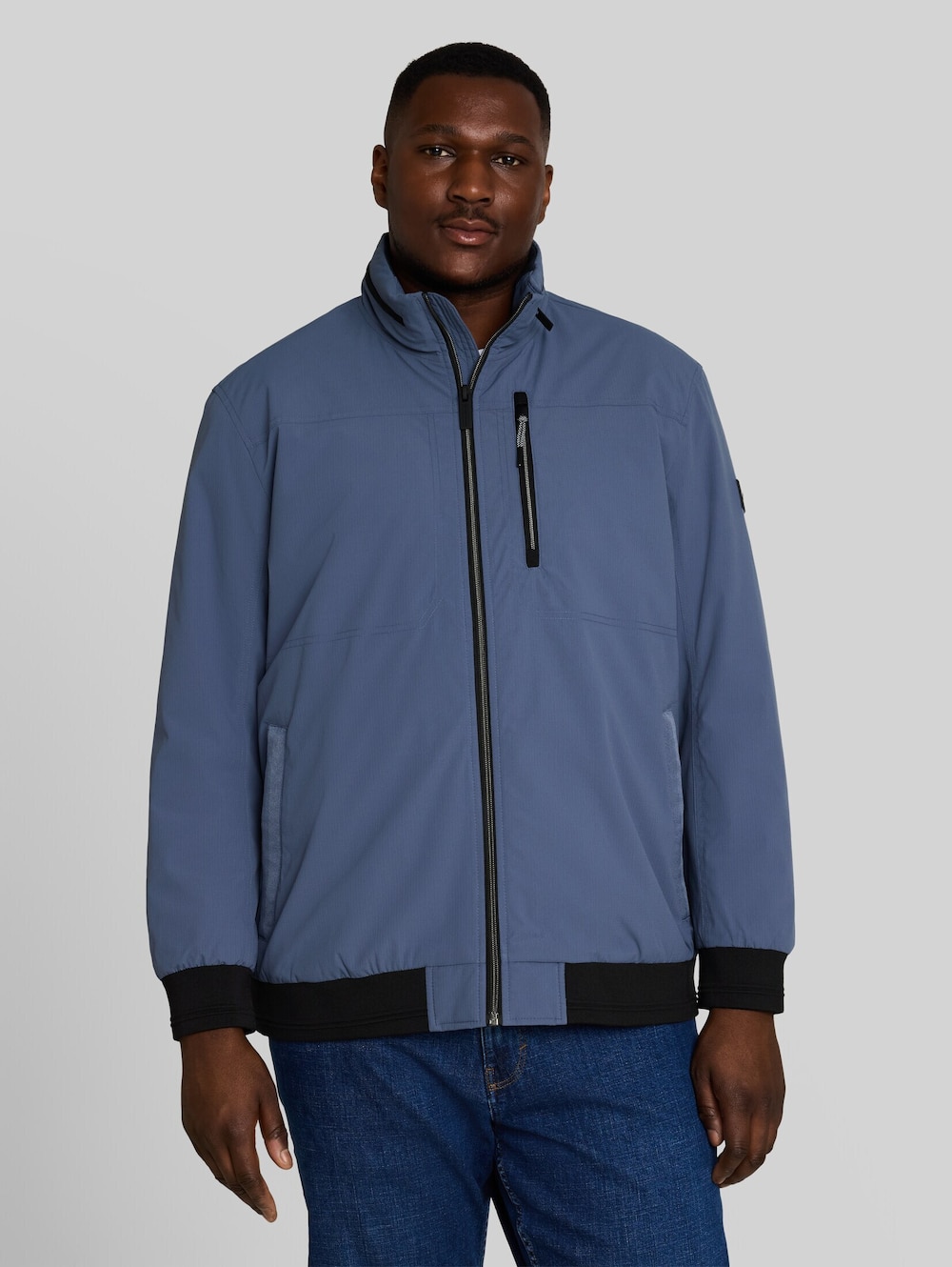 Blouson Jacke mit verstaubarer Kapuze