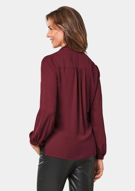 Figurumspielende Bluse mit Schluppe