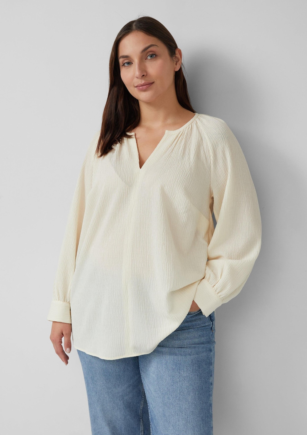 Elastische strukturierte Bluse mit weitem Arm