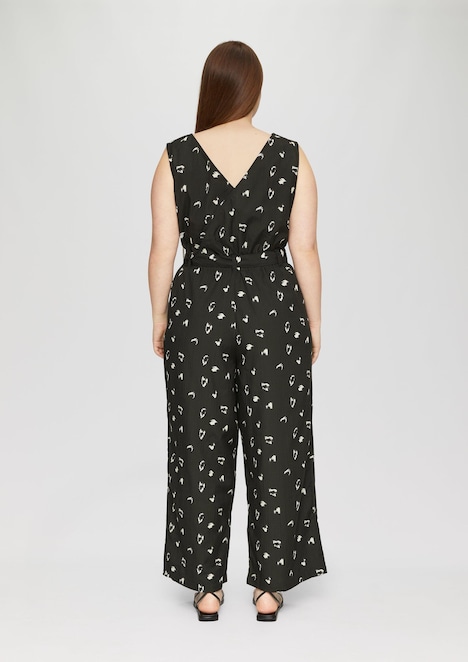 Ärmelloser Jumpsuit mit Eingrifftaschen und Bindeband