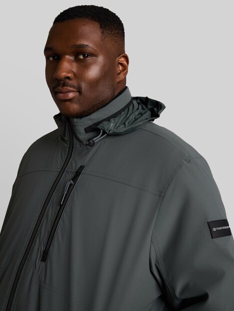 Blouson Jacke mit verstaubarer Kapuze