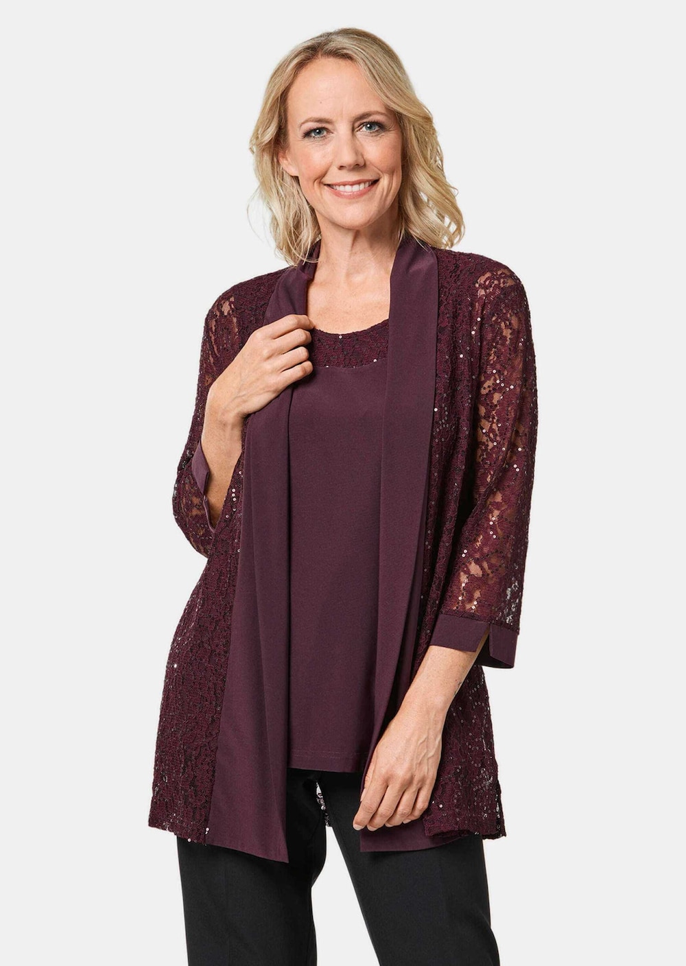 Set aus glitzerndem Spitzenjäckchen und Top