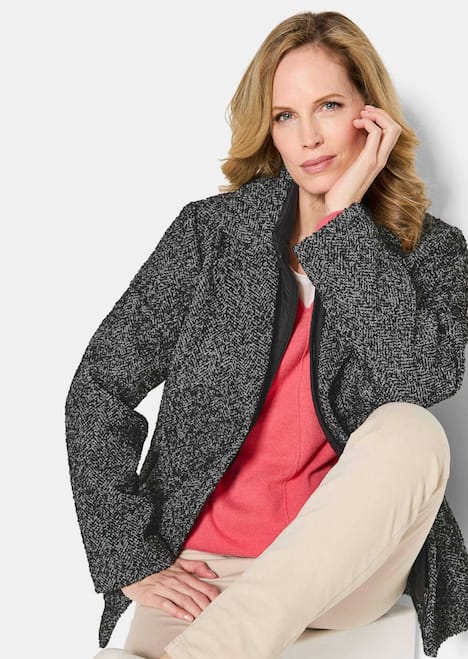 Moderne Wolljacke mit Steppeinsatz