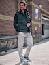 Herren Cord-Weste mit Funktionsdetails , Dunkelgruen