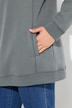 Camiseta sport, cuello alzado ancho, bolsillos, mangas largas raglán