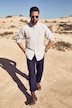 Pantalon en lin mélangé. Taille élastique. Coupe Basic Fit