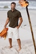 Bermuda en lin mélangé. Taille élastique. Coupe Basic Fit