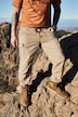 Pantalon cargo, tissu Ripstop. Taille élastique, coupe Tapered Loose Fit.