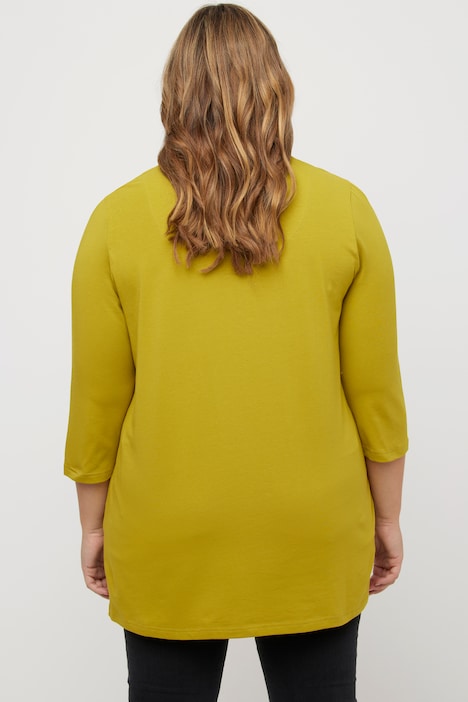 Camiseta larga, forma en A, cuello en V, mangas 3/4