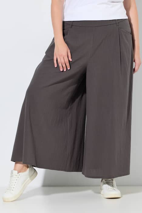 Pantalon 7/8 en coton bio. Jambe large et taille élastique