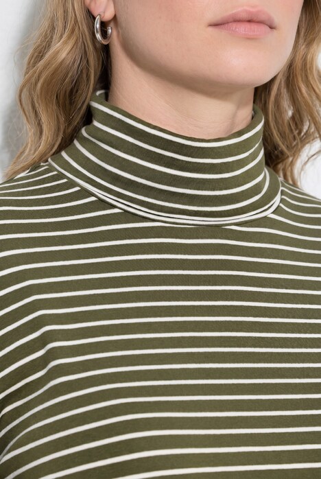 T-shirt côtelé coupe Slim. Col roulé, manches longues et coton bio