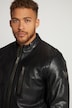 Veste de motard en cuir. Col montant et fermeture zippée