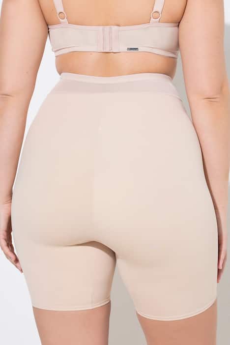 Bermuda gainant, taille haute. Large ceinture en mesh, effet cache-cœur