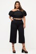 Jupe-culotte longueur au mollet. Jambe large, pinces et taille élastique.