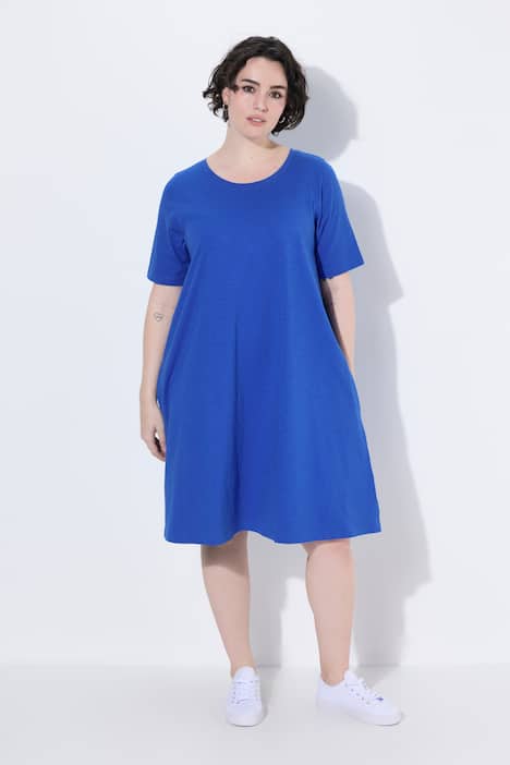 Robe en jersey avec poches, coupe évasée, col rond et manches courtes