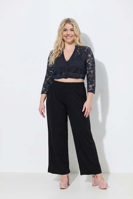 Pantalon en piqué au tombé fluide, jambe large et taille élastique