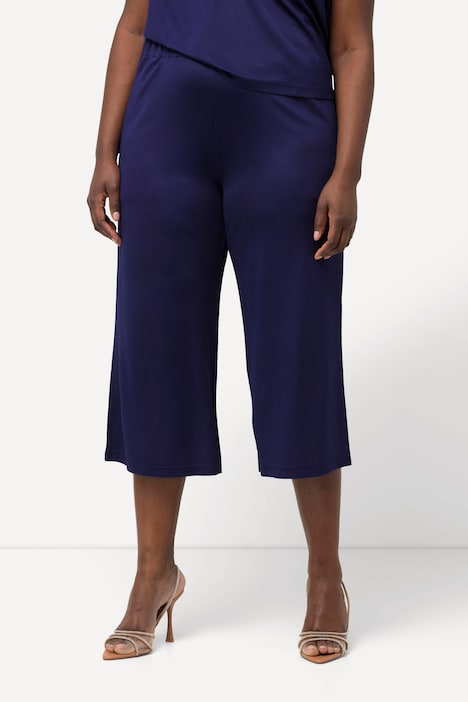 Jupe-culotte longueur mollet, tissu fluide. Jambe large et taille élastique.