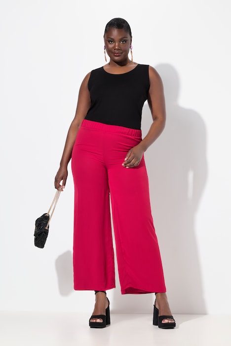 Pantalon double épaisseur, jersey et doublure en mousseline. Jambe large et taille élastique.