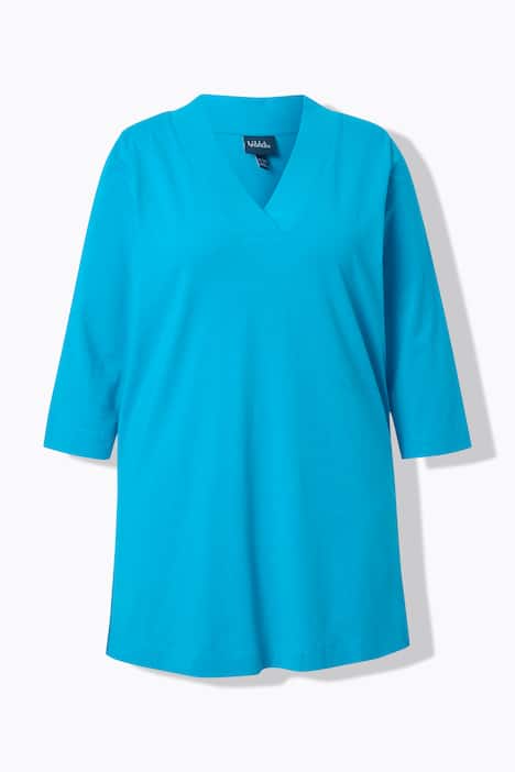 T-shirt long, coupe évasée. Décolleté en V et manches 3/4