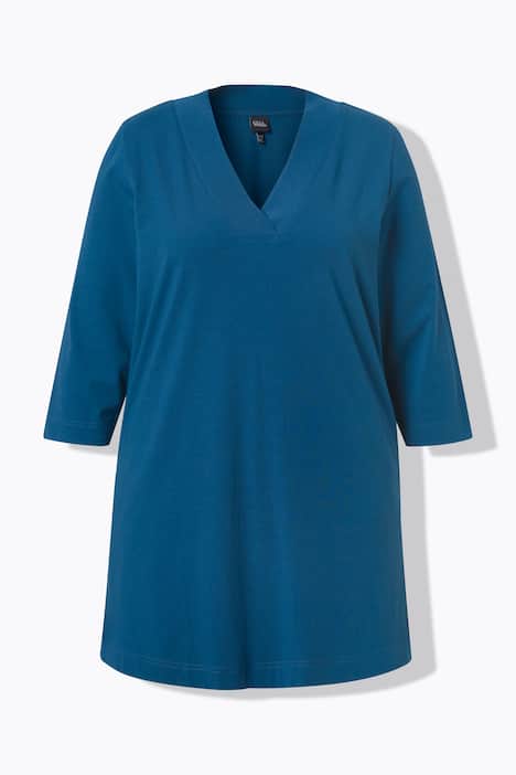 T-shirt long, coupe évasée. Décolleté en V et manches 3/4