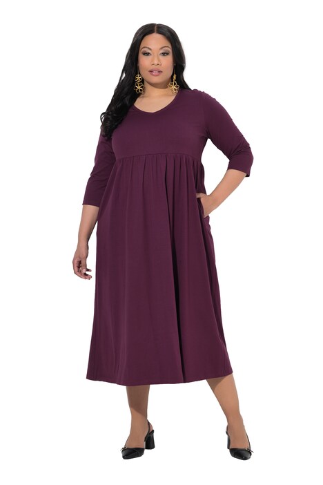 Žerzejové šaty, empírový šev, výstřih do V, 3/4 rukávy, kapsy