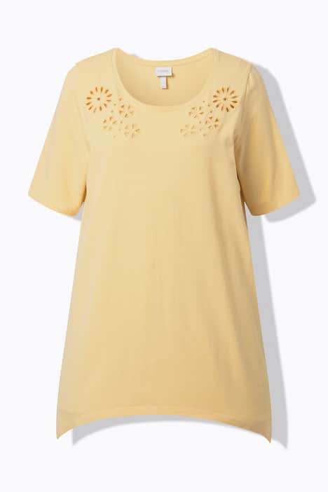 T-shirt avec broderies ajourées. Col rond et manches courtes. Coton bio.